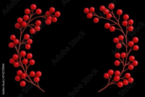 A vibrant red wreath of berries against a stark black background, symbolizing festive cheer and celebration