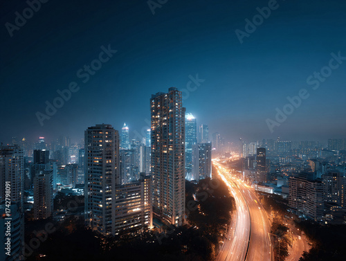 Luminous city at night. Skyline view of illuminated buildings and a vibrant highway. Perfect for urban development, finance, technology, and travel concepts.