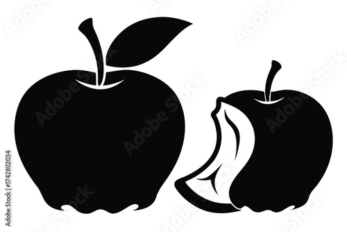 Two apples feature one slice removed in solid black silhouette appearance without shading