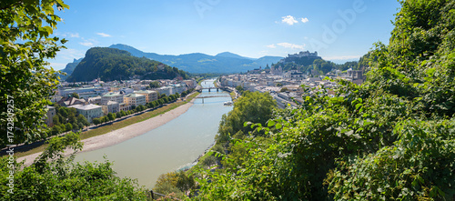 view from Monchsberg mountain to Salzach river and old town Salzburg with the fortress. austrian tourist destination.
