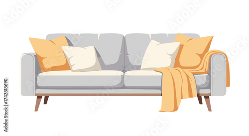 Cozy modern sofa with pillows and throw blanket for stylish living room decor inspiration