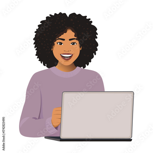 Smiling African woman with curly hair operates her laptop in a portrait