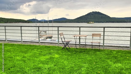 A Serene and Beautiful Table Setting by a Lakeside with an Absolutely Breathtaking Mountain View