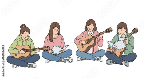 Group of young women sitting and playing guitar together while reading music sheets
