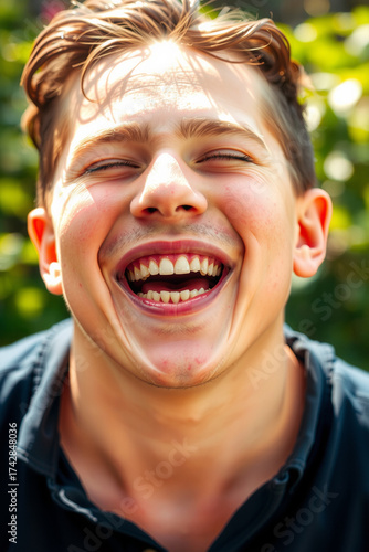 Teenager with Acne Laughing in Natural Sunlight