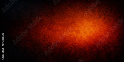 Abstract fire explosion background texture with orange and red flame motion against dark space for hot design art wallpaper