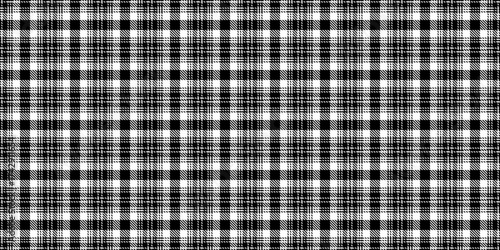 Classic black and white plaid pattern. Versatile and timeless, perfect for backgrounds, textiles, and designs. Use for fashion, home decor, or graphic projects.