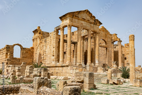 Ruins of ancient Roman capitol forum on territory of antic city of Sufetula in area of modern Tunisia. Half-destroyed buildings from time of Roman Empire. Roman Forum of Sufetula