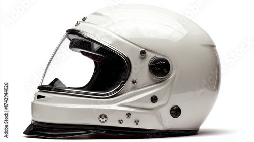 a white motorcycle helmet with a clear visor is prominently displayed against a neutral background. the helmet features a textured surface and has a black panel near the chin section