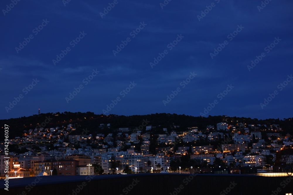 Fototapeta premium Beautiful view of coastal city in evening