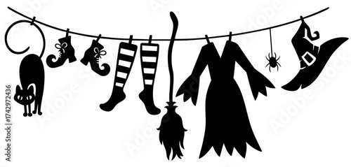 Witch clothes and accessories hanging on line — dress, hat, broom, boots and cat, halloween silhouette