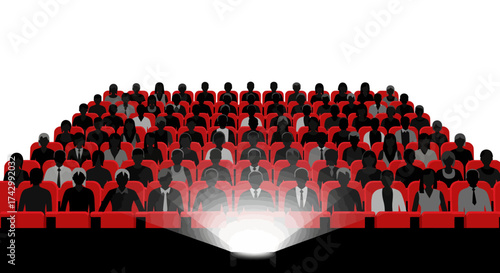 A diverse audience of people sitting in a movie theater watching a bright screen.