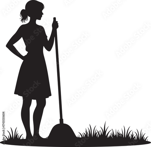 Black silhouette of woman with mop standing in grass