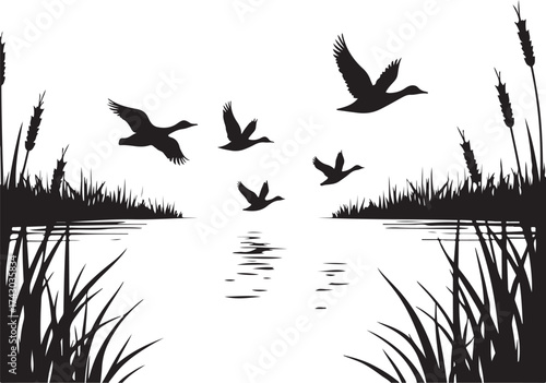 Flock of ducks flying over water with reeds birds