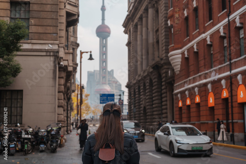 Photography woman traveler visiting in Shanghai, China