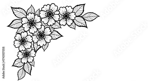 A black and white floral corner design featuring detailed blossoms and leaves, isolated on a white background.