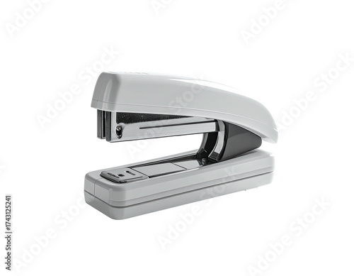 Close-up of a gray stapler, slightly angled, against a black background