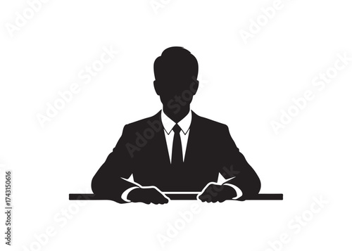 Vector art of silhouette of a businessman in suit sitting at desk