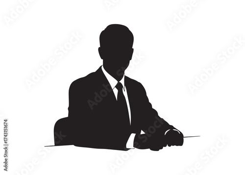 Vector art of silhouette of a businessman sitting at a desk