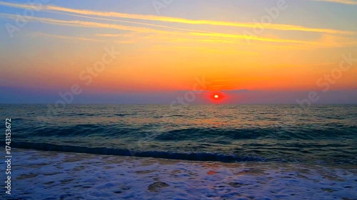 Beautiful summer sunrise over the beach