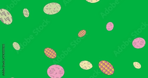 Digital animation of colorful decorative easter eggs icons falling against transparent background