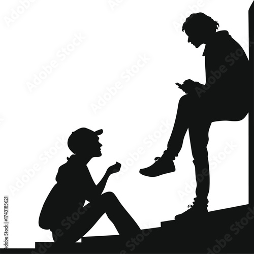 Two people in silhouette talking and reading outdoors silhouette