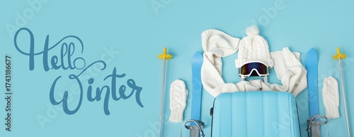 Suitcase with winter clothe...