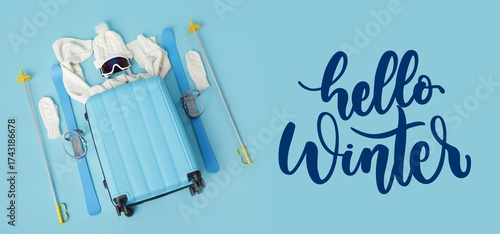 Suitcase with winter clothe...
