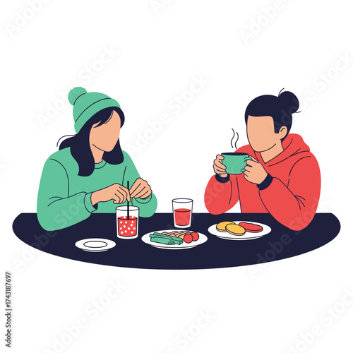 Two people sitting at a table eating and drinking together.