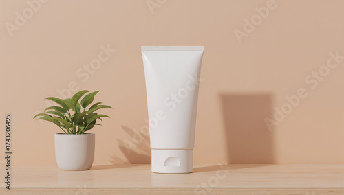 White cosmetic tube and green plant white tube skincare