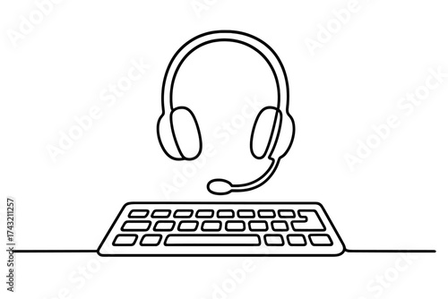 Headset and keyboard on a desk ready for gaming or online communication sessions
