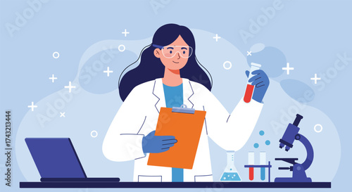 Female scientist in lab coat holding test tube with red liquid working with microscope and laptop.