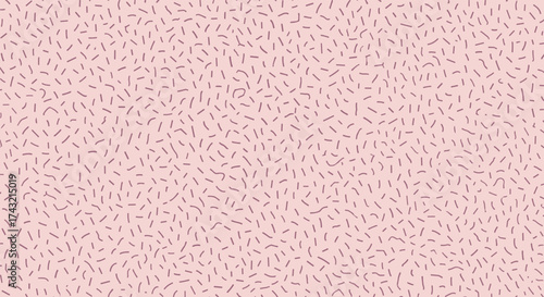A playful abstract background with scattered dark dashes on a soft pink surface.
