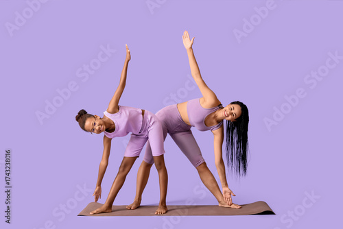 Two diverse women practicin...