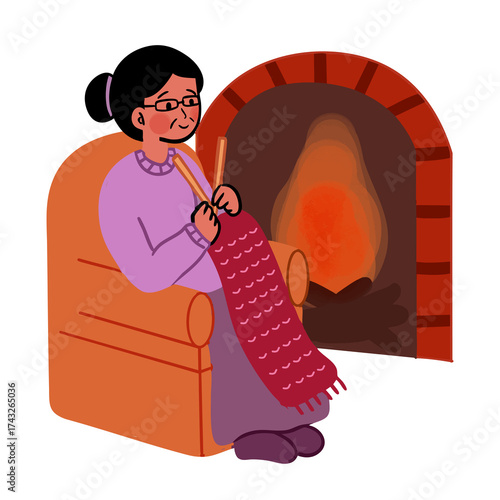 Knitting with wool by the fireplace on a snowy day. Knitting with wool as a cozy winter activity