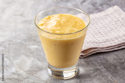 Sweet mango smoothie dessert glass