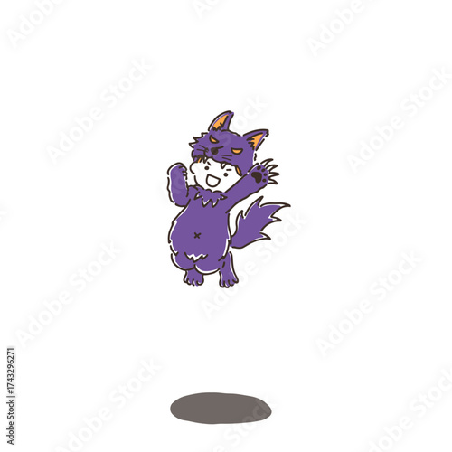狼男の仮装でジャンプしている男の子