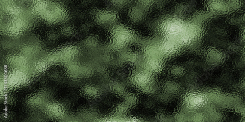 Black frosted glass texture background with glossy effect. Green colored glass blur texture with grainy surface. Abstract background design with distorted glass surface.