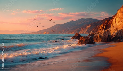 Coastal sunset with birds flying over a sandy beach