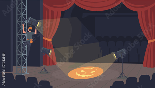 Stage technician adjusting lights for a Halloween performance in an empty theater