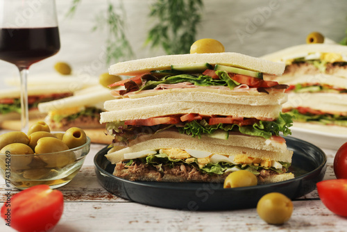 Different Italian tramezzini sandwich in tradition triangle form