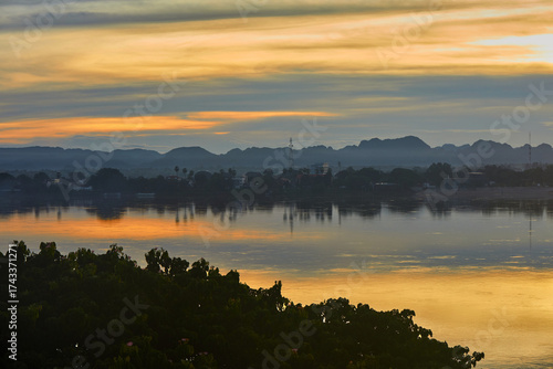 Sunset over border short of Mea-Kong river between Thailand and Laos