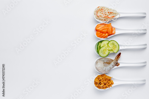 Wallpaper Mural White spoons with sushi ingredients - salmon, shrimp Torontodigital.ca