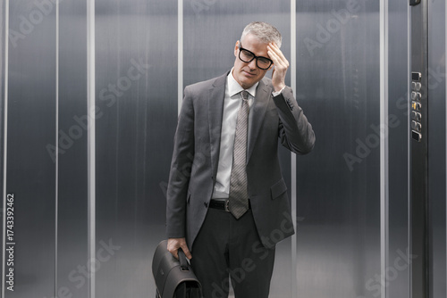 Business executive suffering from headache