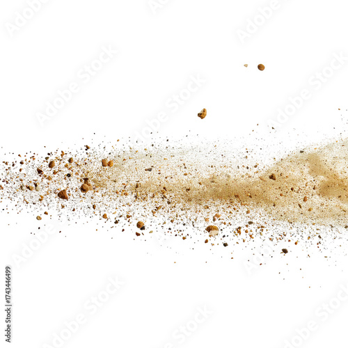 Close-up of sand and small pebbles scattered across a black backdrop, creating a path