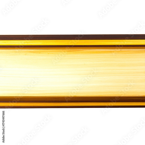 Close-up horizontal frame with brown and gold tones; lit with a central lighter area