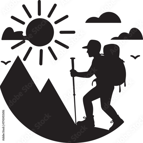 Silhouette of a hiker ascending a mountain under a bright sun climbing hiking