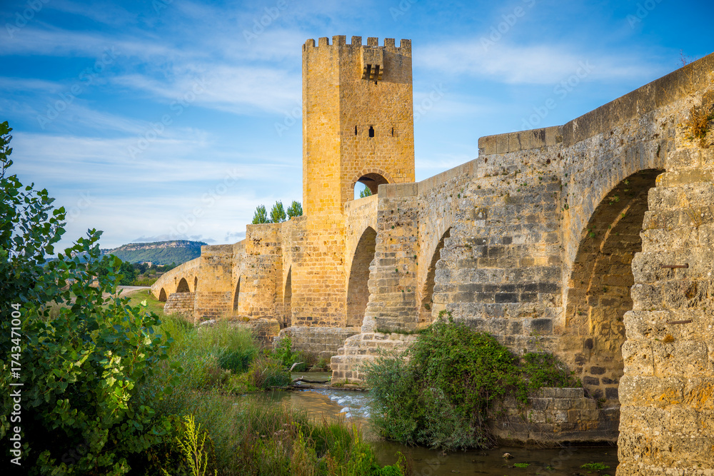 Obraz premium View at Puente medieval de Frias. Medieval bridge near the town, crossing the Ebro river.