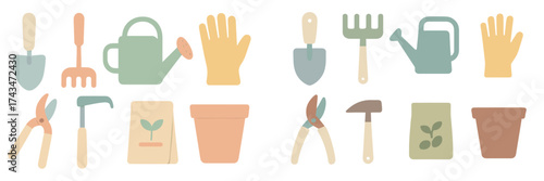 Gardening tools arranged on a light background, showcasing essentials for planting and caring for plants
