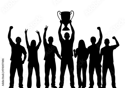 Celebration of victory and achievement with a team holding up a championship trophy with raised arms in a silhouette